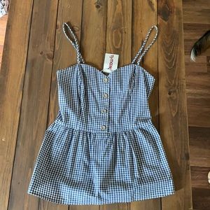 Blue and white checker tank